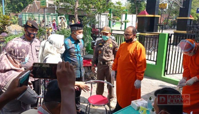 Abang Baginda dan Sulistyorini Berikan Masker serta Swab Gratis