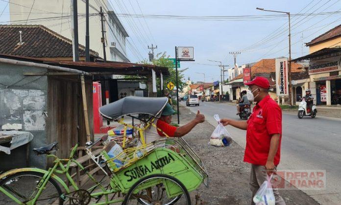 Sosialisasikan TIM, H. Munawir Bagikan Sembako