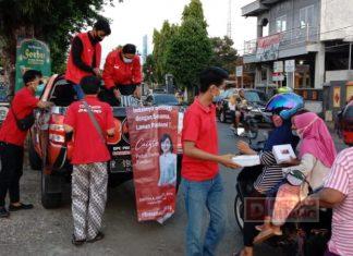 Komunitas Juang Cilacap Bagikan Makanan Buka Puasa Kepada Kaum Dhuafa