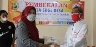 Sri Ruwiyati Bagikan Bantuan 900 Kantong Beras