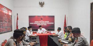 Satgas Kabupaten Tegal Bersama Projo Semprot Disinfektan dan Bagikan Masker