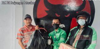 Peduli Sesama, PAC Petarukan Bagikan Makanan Gratis