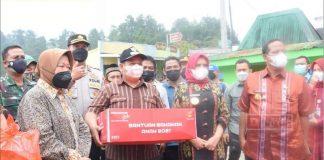 Riswadi Dampingi Kunjungan Mensos Risma Cek Korban Banjir