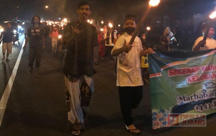 Sinergi dengan Masyarakat Bancar, Agung Gelar Pawai Obor Sambut Bulan Ramadhan