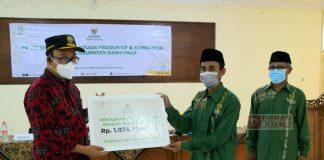 Bupati Husein Serahkan Bantuan dari BAZNAS Banyumas Kepada 997 Mustahik