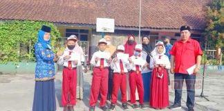 Upacara Perayaan HUT RI ke-77, Edy Shinchan Berikan Bantuan PIP Aspirasi Mbak Puan