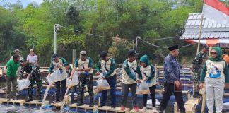 Bambang Hadiri HUT TNI Dengan Tanam Pohon Tabubia dan Tebar Benih Ikan