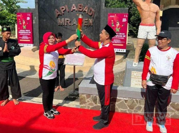 Serahkan Obor Api Pospenas, Sri Sumarni Bentuk Keharmonisan Antar Umat Beragama