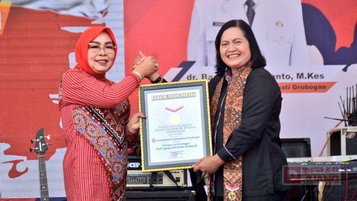 Sri Sumarni Apresiasi Raihan MURI Memipil Jagung Terbanyak