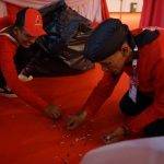 Korps Komunitas Juang Laksanakan Giat Kebersihan di Rakernas V PDI Perjuangan